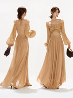 FLOWIG MAXIKLÄNNING MED FJÄRILSSTIL TOPP