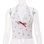 VIT TOPP MED KÖRSBÄRPRINT OCH SPETS